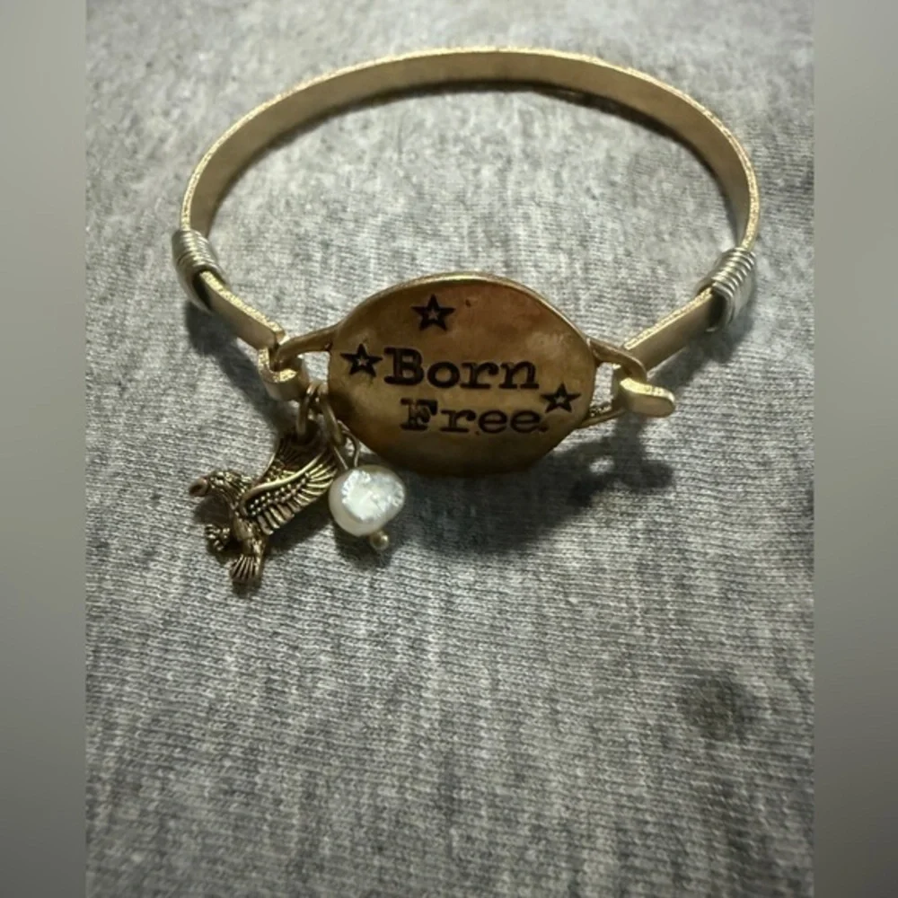 Gold 'Born Free' Bracelet with Charms